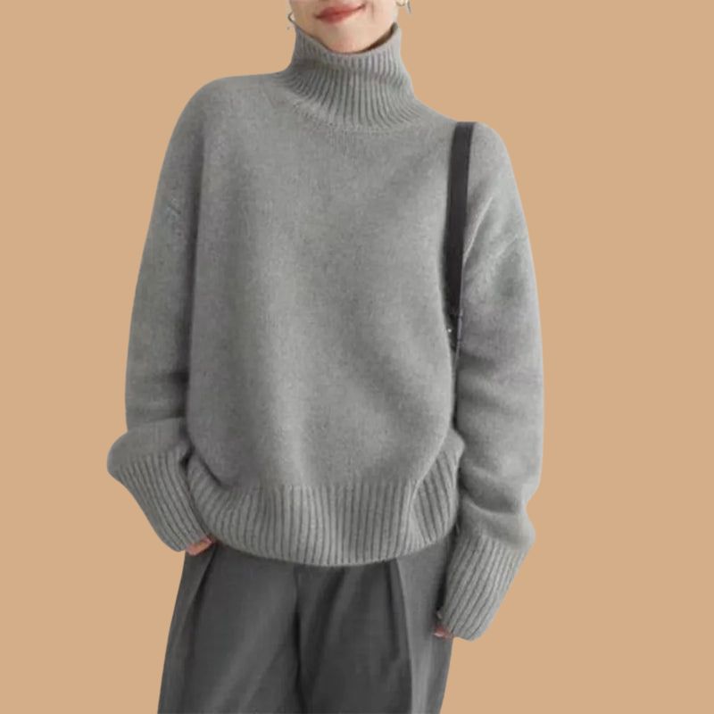 Women’s Roll Neck Jumper with Oversized Fit and Ribbed Cuffs