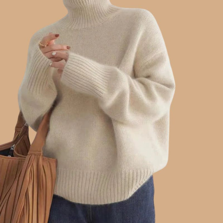 Women’s Roll Neck Jumper with Oversized Fit and Ribbed Cuffs