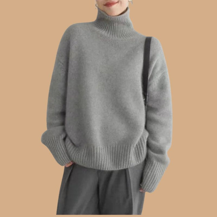 Women’s Roll Neck Jumper with Oversized Fit and Ribbed Cuffs
